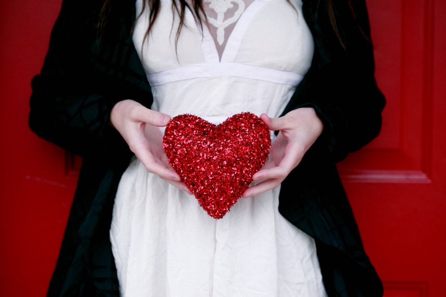 Girl holding a sparkly heart