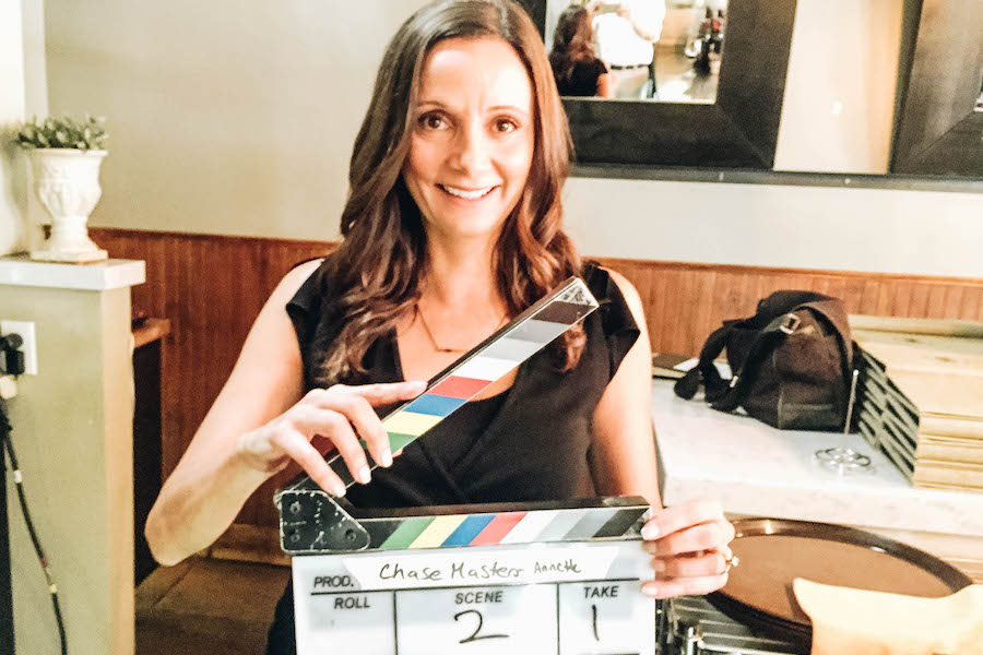 Annette White with a Clapperboard