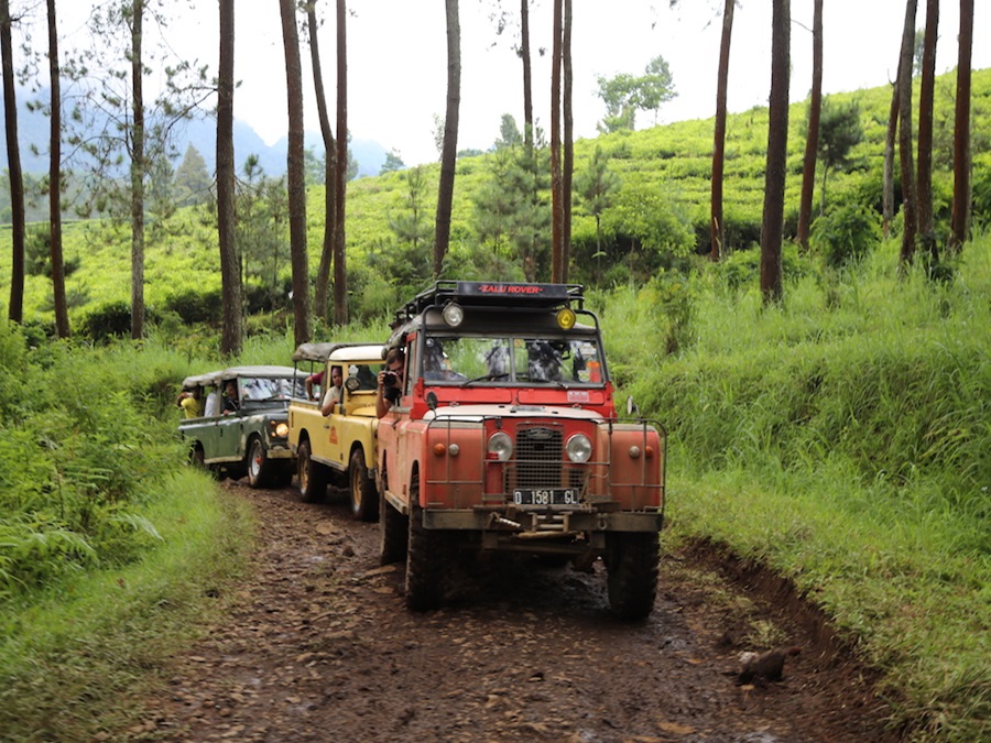 A caravan of Land Rovers while off-roading in Bandung, Indonesia