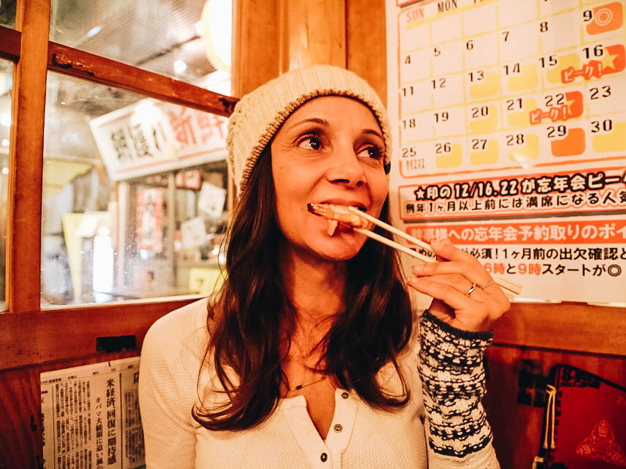 Annette eating at an Izakaya Sendai Japan