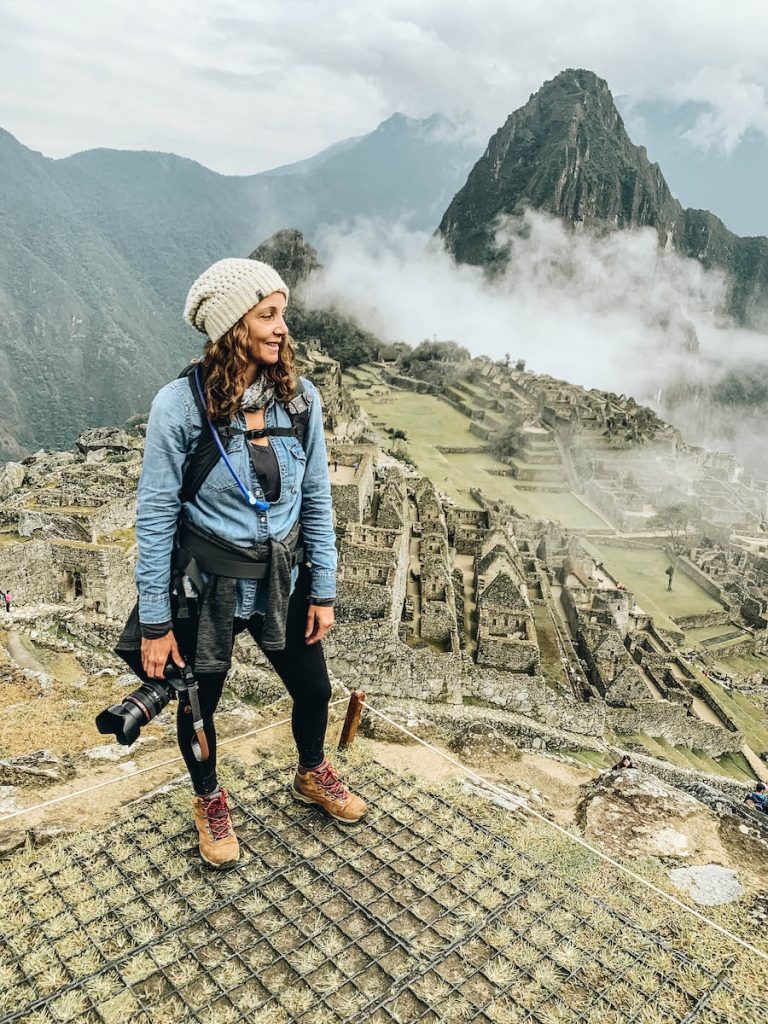 Annette standing at Historic Sanctuary of Machu Picchu, Peru
