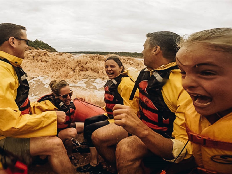 Annette and Pete enjoying Tidal Bore Rafting at Nova Scotia